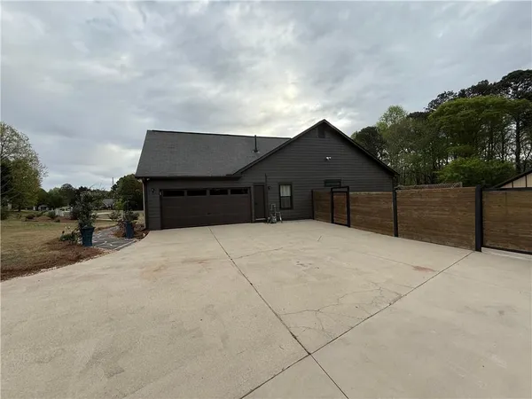a house view with a garden space