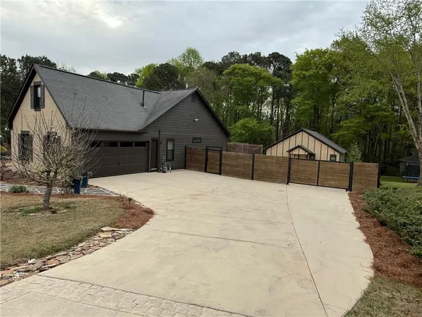 a house view with a outdoor space