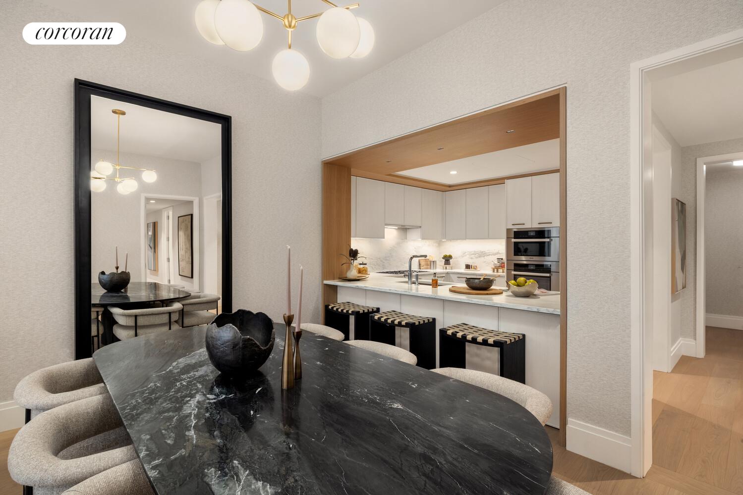 50 West 66th Street, Unit 8B Manhattan, NY 10023 - Photo 7 of 43 a living room with stainless steel appliances kitchen island granite countertop furniture a rug and a view of kitchen