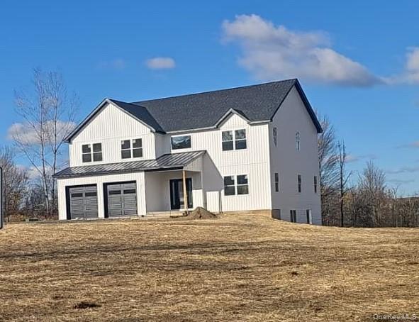 Lot 13-27 Sawyer Way Wallkill, NY 12589 - Photo 1 of 35 a front view of a house with a yard