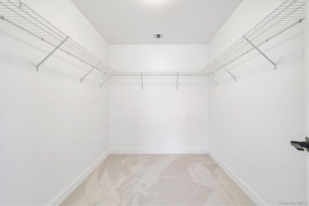 Lot 13-27 Sawyer Way Wallkill, NY 12589 - Photo 23 of 35 a view of a room with racks on the wall