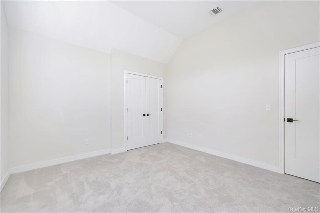 Lot 13-27 Sawyer Way Wallkill, NY 12589 - Photo 26 of 35 an empty room with an entryway