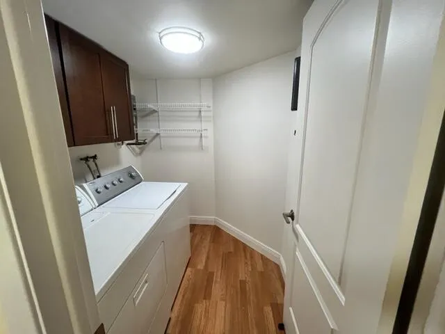 a view of bathroom with a sink and mirror