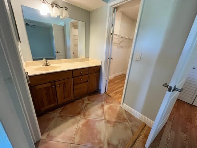 2255 Lindell Boulevard, Unit 4209 Delray Beach, FL 33444 - Photo 5 of 15 a bathroom with a tub sink vanity and mirror