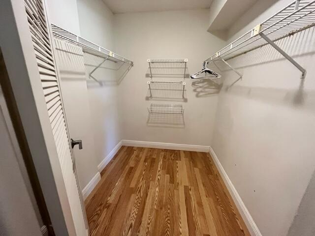 2255 Lindell Boulevard, Unit 4209 Delray Beach, FL 33444 - Photo 10 of 15 a view of a room with racks on the wall