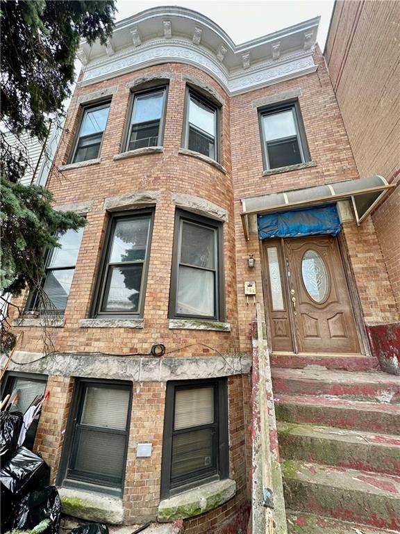868 55th Street Brooklyn, NY 11220 - Photo 9 of 9 a front view of a multi story residential apartment building