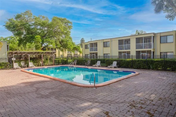 a view of outdoor space yard and swimming pool