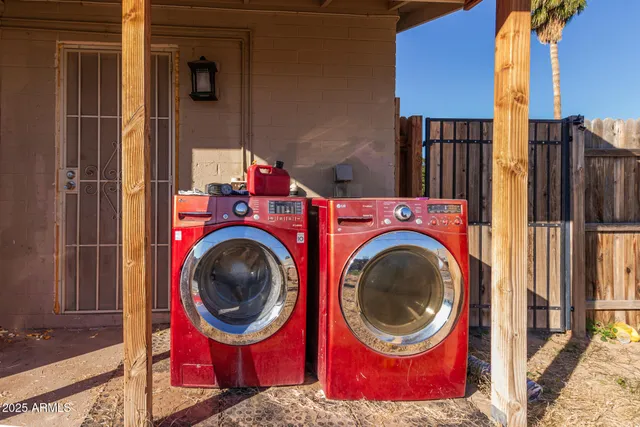 a utility room with dryer and washer