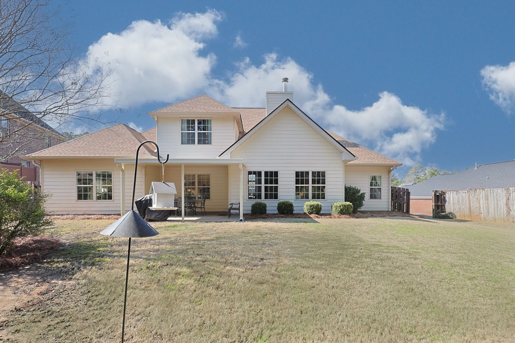 6712 Bridge Way Columbus, GA 31904 - Photo 32 of 36 a front view of a house with a yard