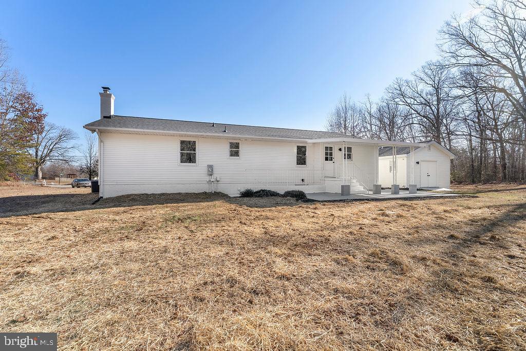 8140 Courthouse Road Spotsylvania, VA 22551 - Photo 36 of 38 a view of house with backyard and garden
