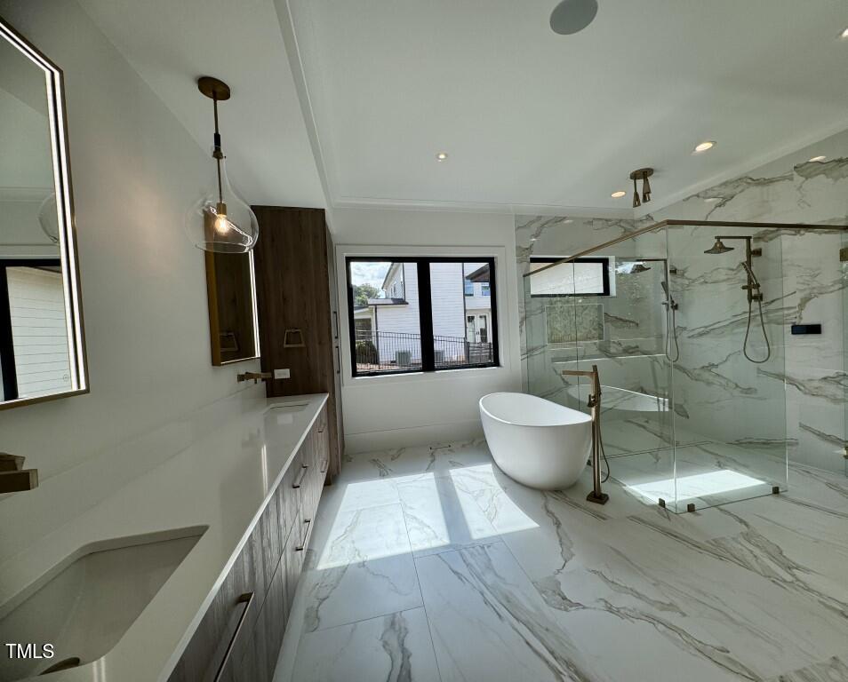 822 Cranbrook Road Raleigh, NC 27609 - Photo 11 of 60 a bathroom with a sink and mirror