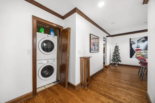 a view of a hallway with washer and dryer