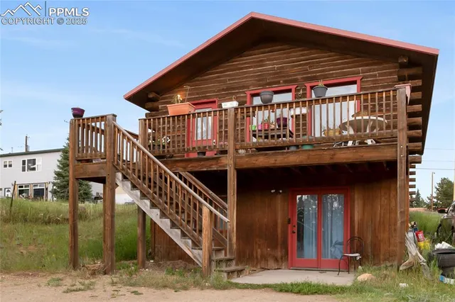 a view of house with staircase and wooden floor