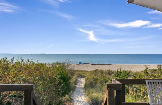 a view of a lake with a mountain in the background
