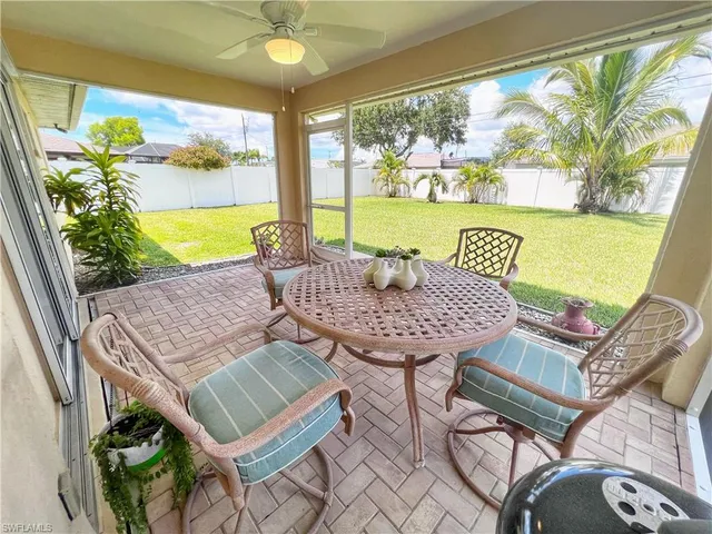 a view of a city from a dining room with furniture window and outside view