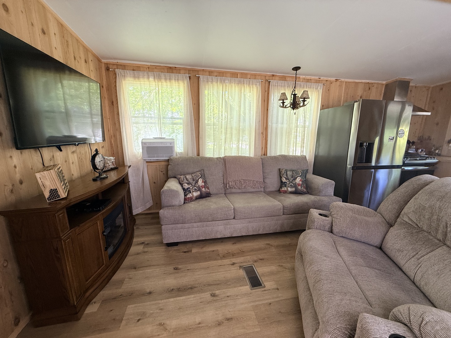 25-4 Woodhaven Lakes Sublette, IL 61367 - Photo 11 of 26 a living room with furniture and a flat screen tv