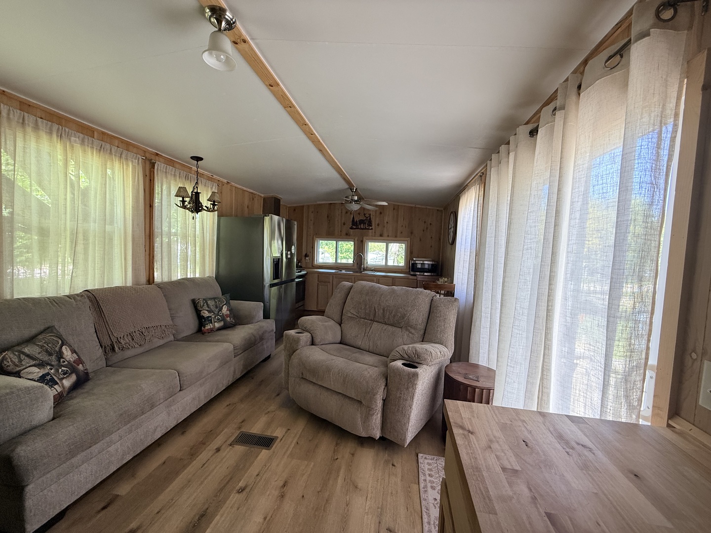25-4 Woodhaven Lakes Sublette, IL 61367 - Photo 12 of 26 a living room with furniture and a large window