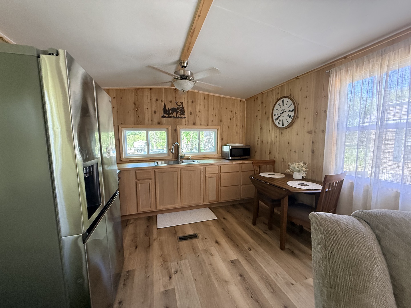 25-4 Woodhaven Lakes Sublette, IL 61367 - Photo 13 of 26 a kitchen with sink refrigerator and window