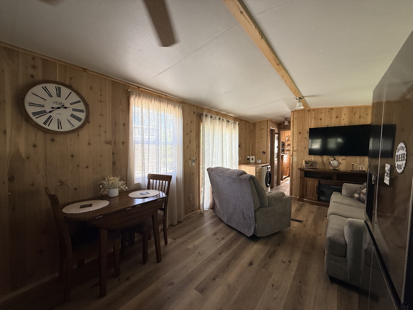 25-4 Woodhaven Lakes Sublette, IL 61367 - Photo 15 of 26 a living room with furniture and a flat screen tv