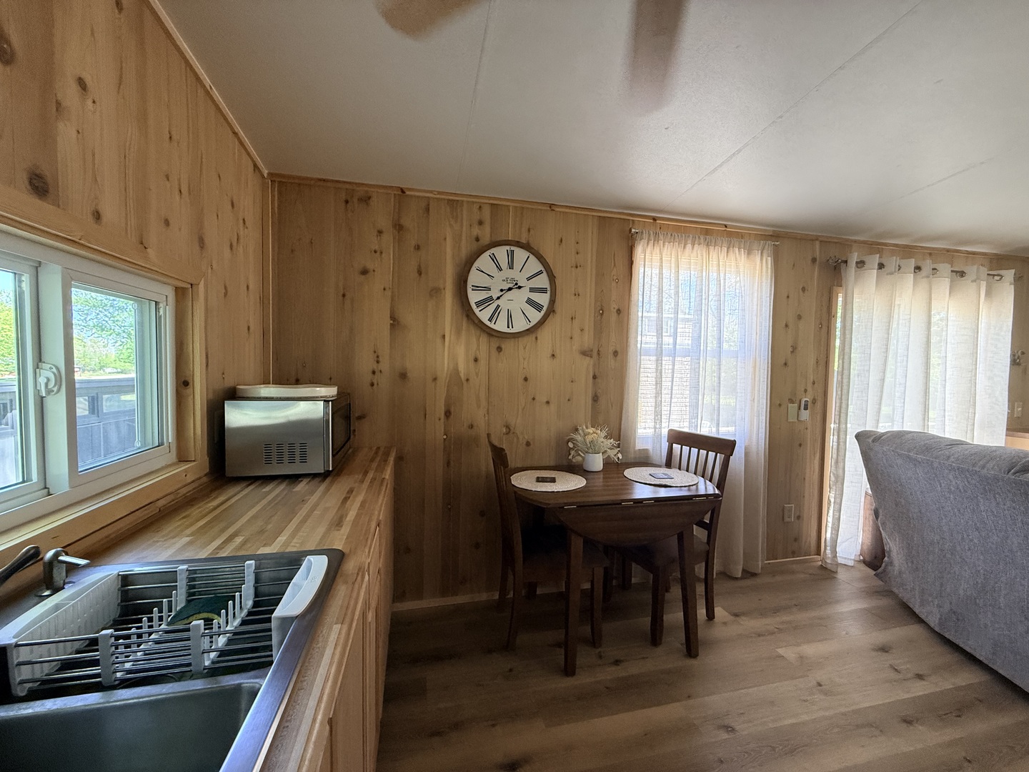 25-4 Woodhaven Lakes Sublette, IL 61367 - Photo 16 of 26 a living room with furniture and a table