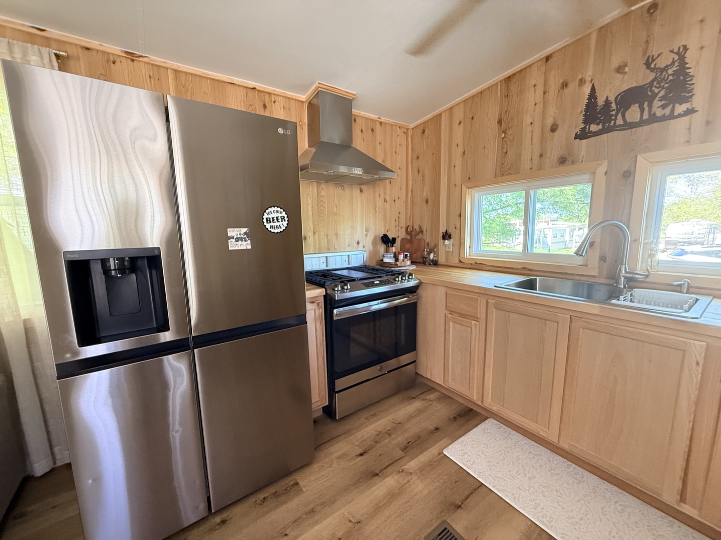 25-4 Woodhaven Lakes Sublette, IL 61367 - Photo 17 of 26 a kitchen with stainless steel appliances a refrigerator sink and cabinets