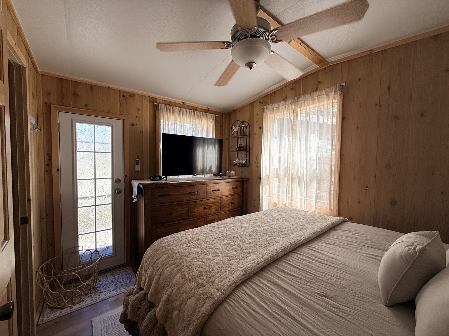 25-4 Woodhaven Lakes Sublette, IL 61367 - Photo 23 of 26 a bedroom with a bed and a flat screen tv