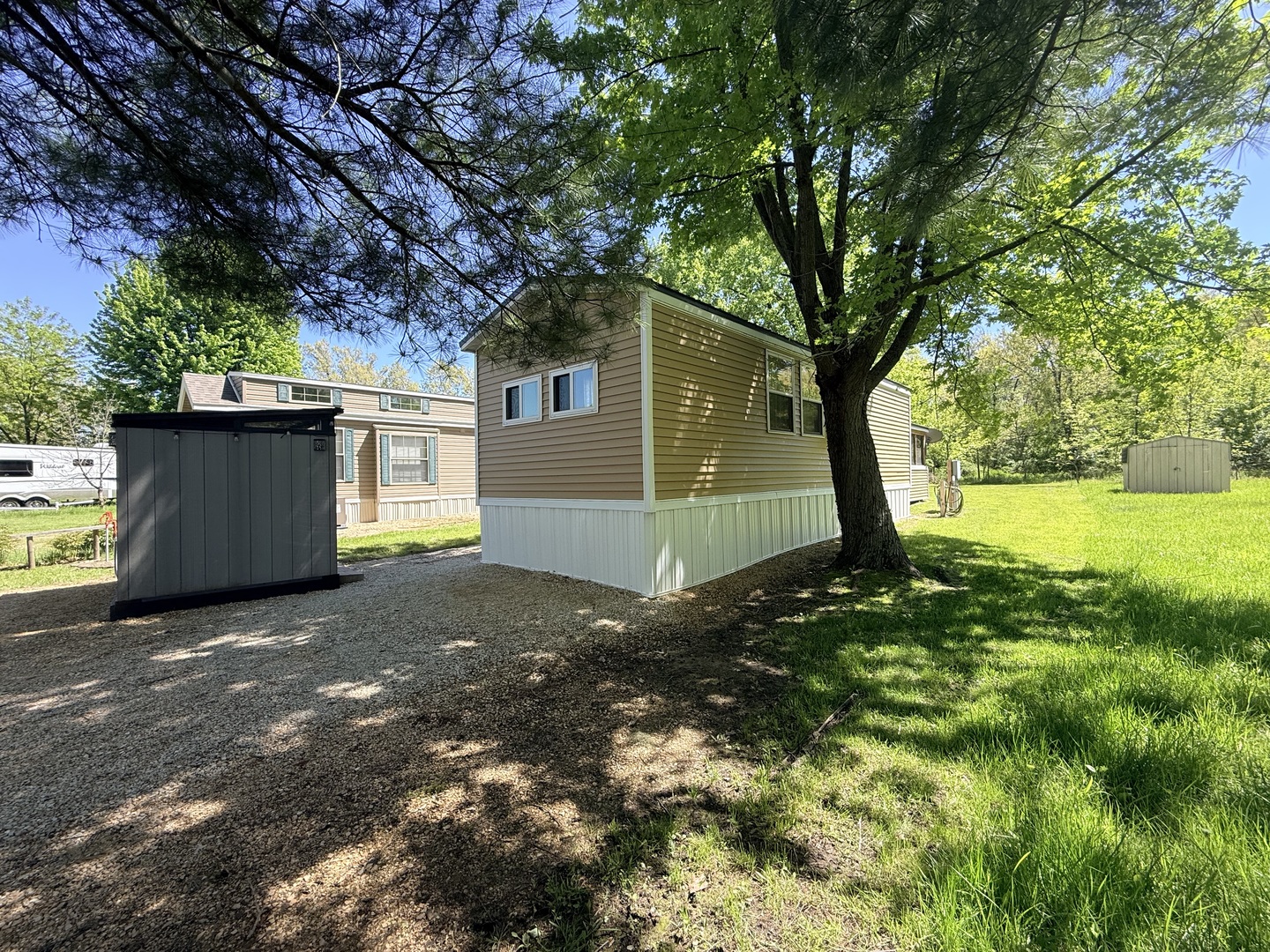 25-4 Woodhaven Lakes Sublette, IL 61367 - Photo 25 of 26 a view of a tree in a yard