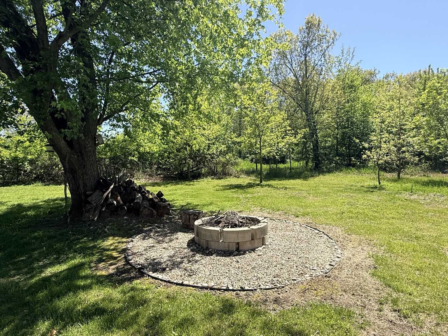 25-4 Woodhaven Lakes Sublette, IL 61367 - Photo 9 of 26 a view of a backyard with a garden