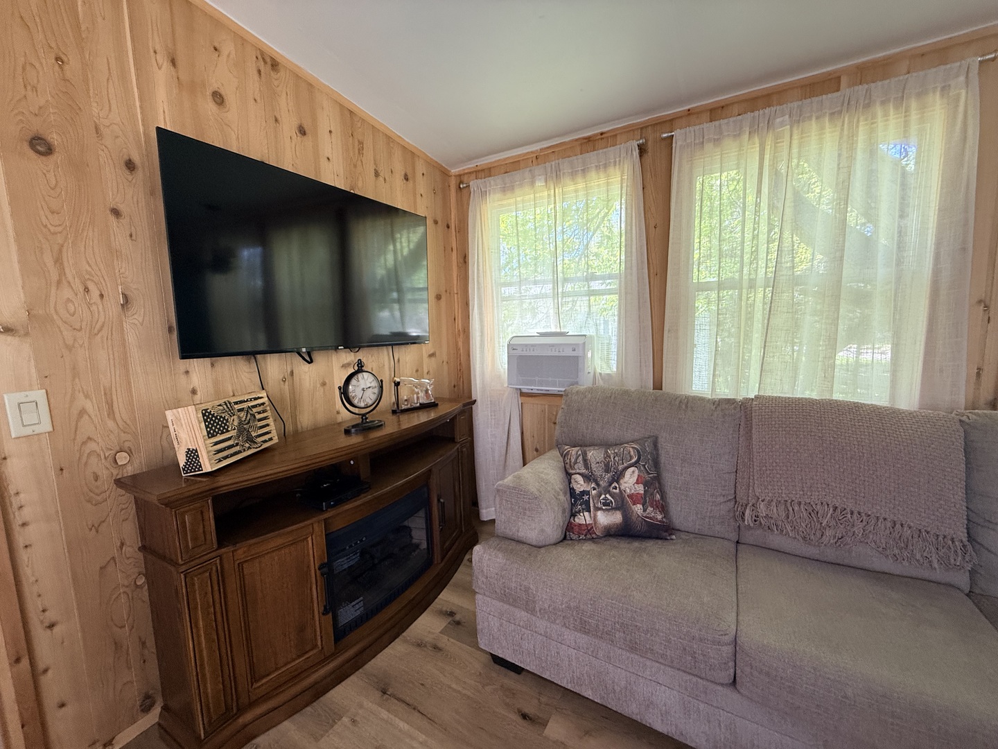 25-4 Woodhaven Lakes Sublette, IL 61367 - Photo 10 of 26 a living room with furniture and a flat screen tv