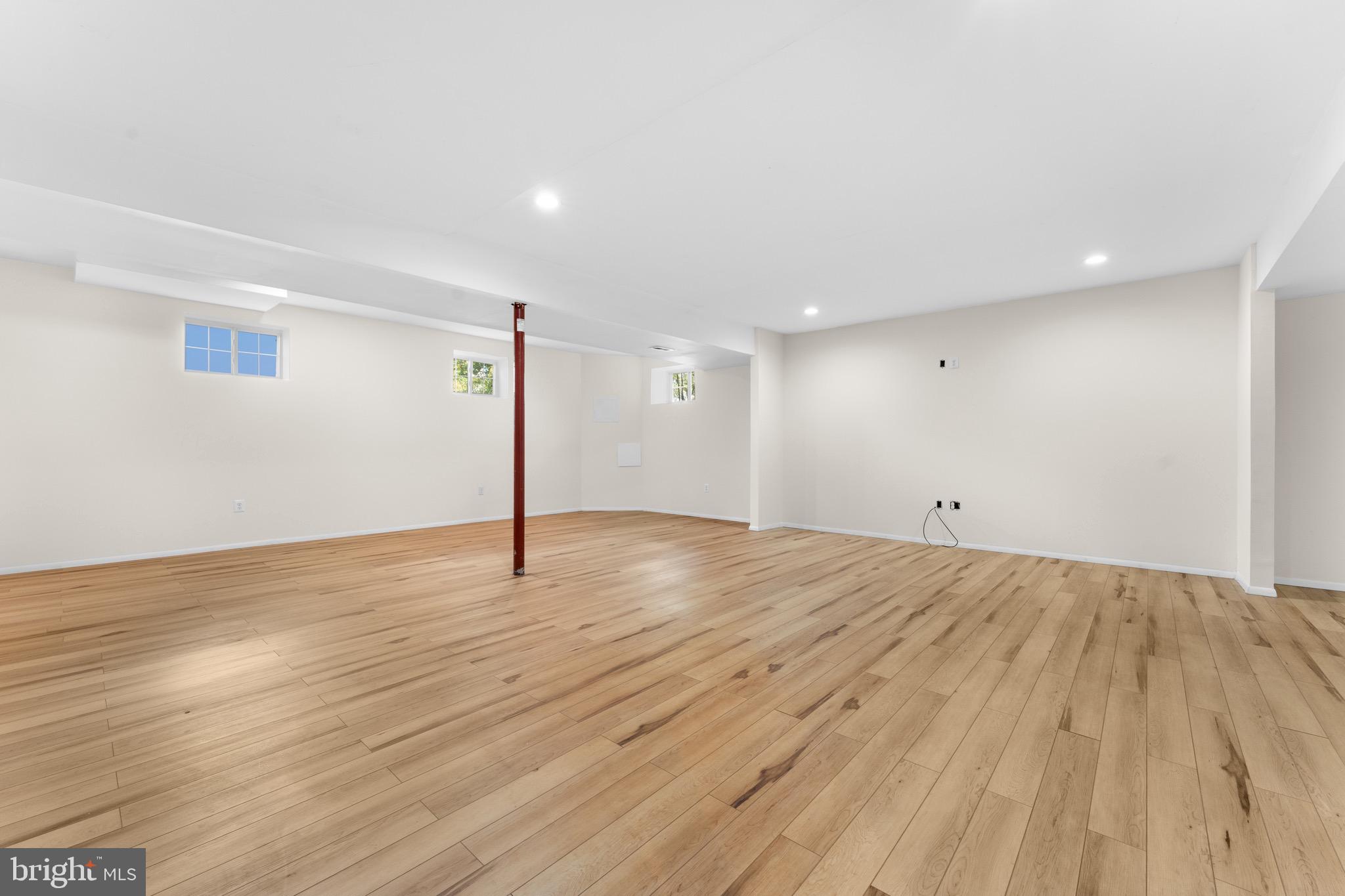 19065 Stallion Road Culpeper, VA 22701 - Photo 32 of 40 a view of empty room with wooden floor