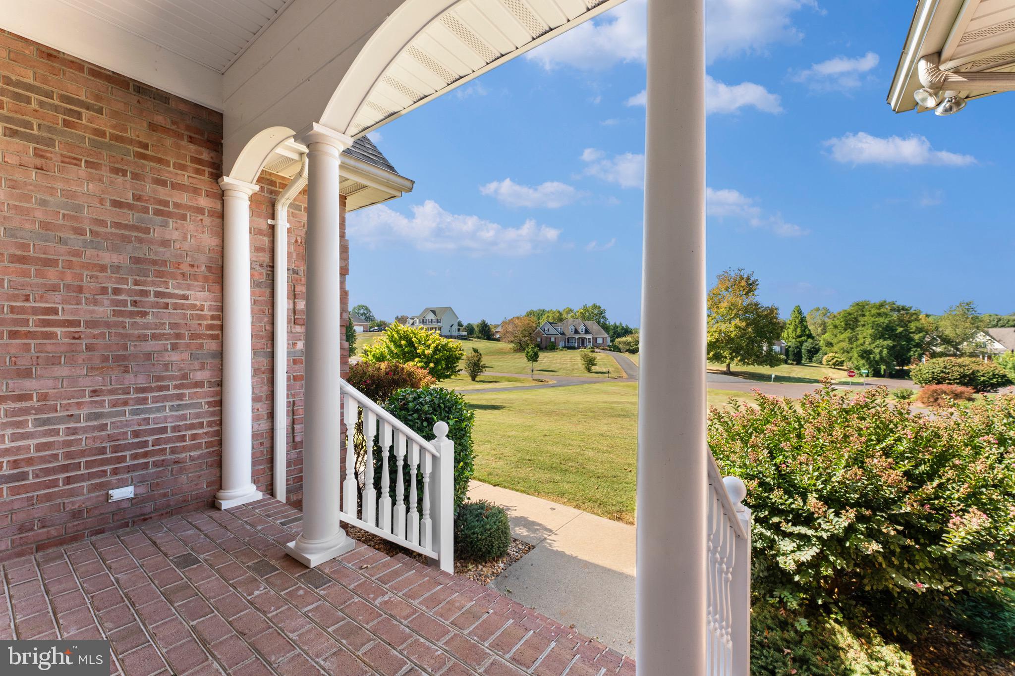 19065 Stallion Road Culpeper, VA 22701 - Photo 4 of 40 a view of a balcony with lake view