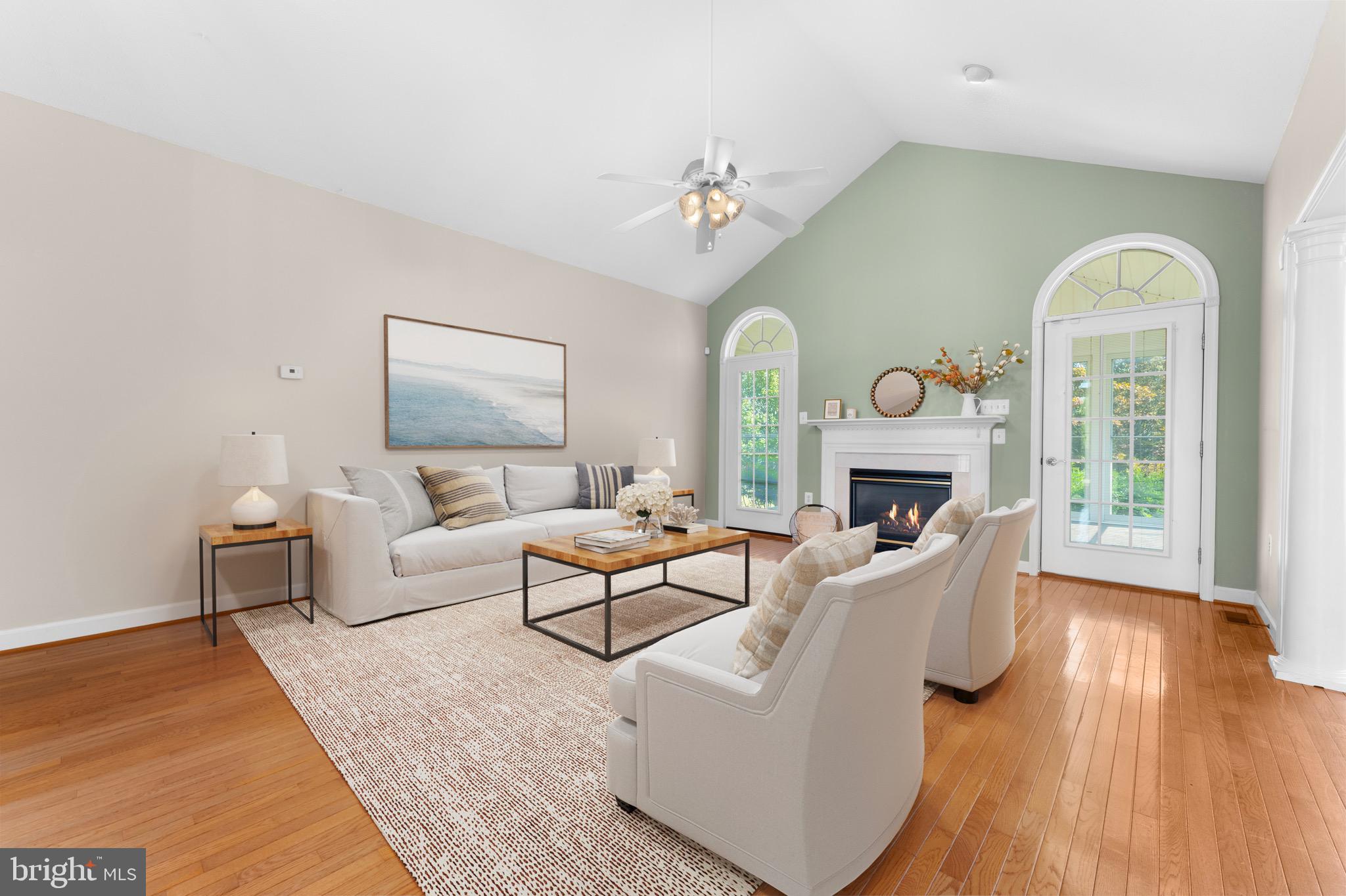 19065 Stallion Road Culpeper, VA 22701 - Photo 9 of 40 a living room with furniture a fireplace and a table
