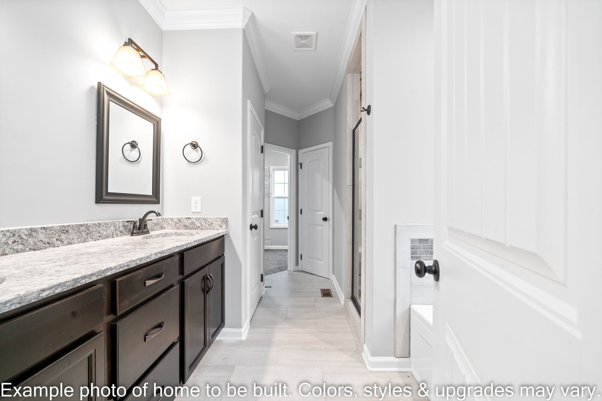 929 Inverness Lane Clarksville, TN 37043 - Photo 21 of 42 a spacious bathroom with a granite countertop sink and a mirror