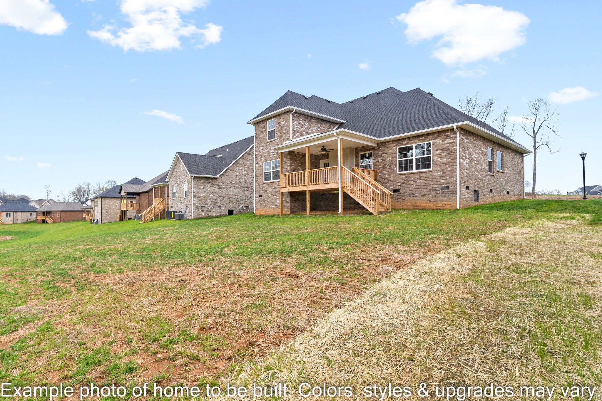 929 Inverness Lane Clarksville, TN 37043 - Photo 39 of 42 a front view of a house with a yard and garage