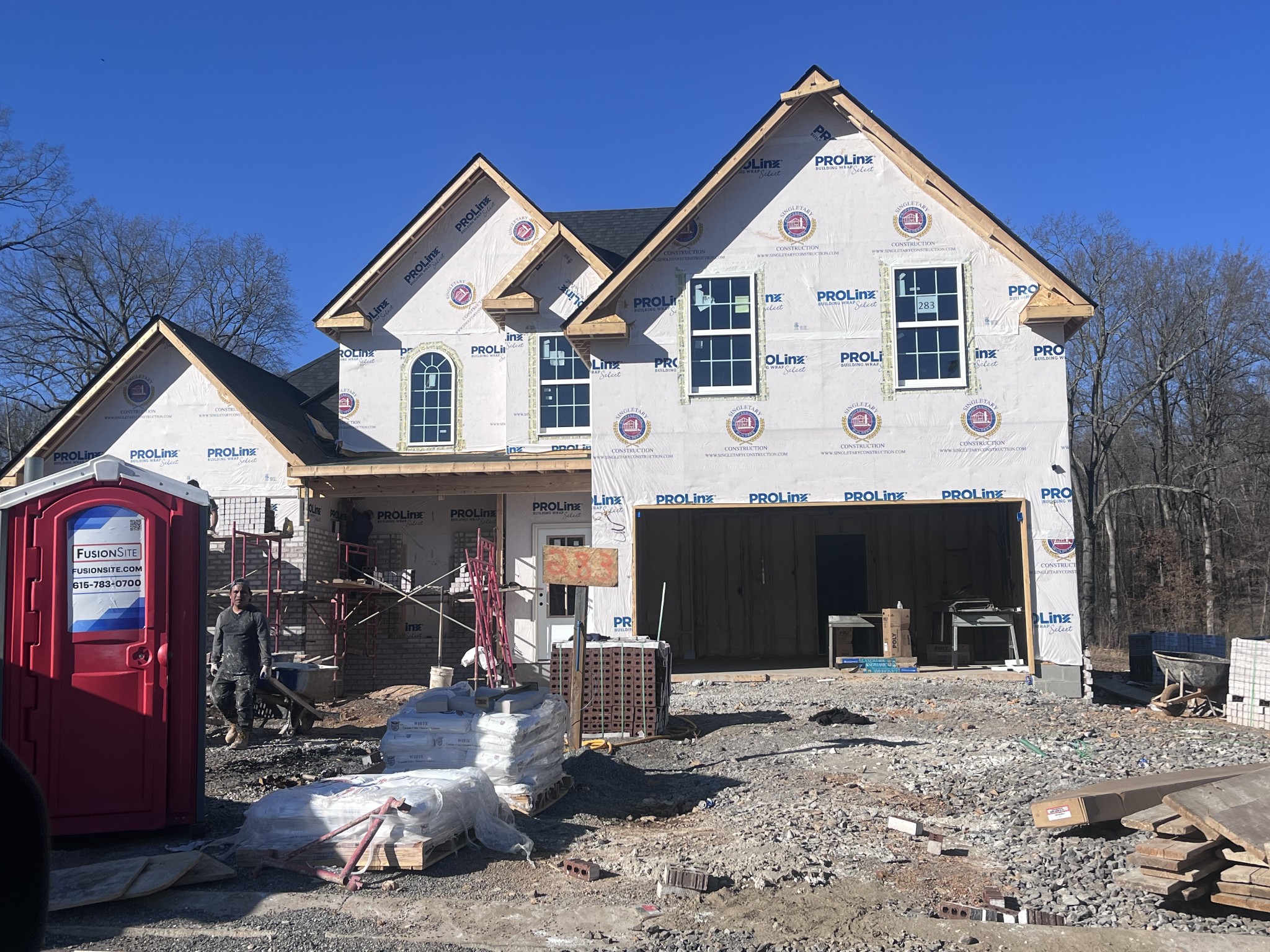 929 Inverness Lane Clarksville, TN 37043 - Photo 4 of 42 a view of a white house with large windows and a yard