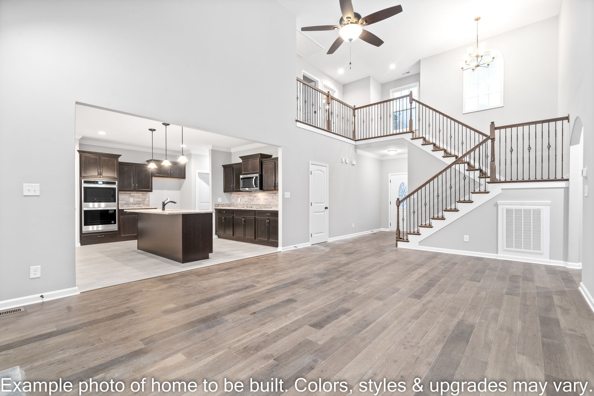 929 Inverness Lane Clarksville, TN 37043 - Photo 9 of 42 a view of a kitchen with wooden floor and stainless steel appliances
