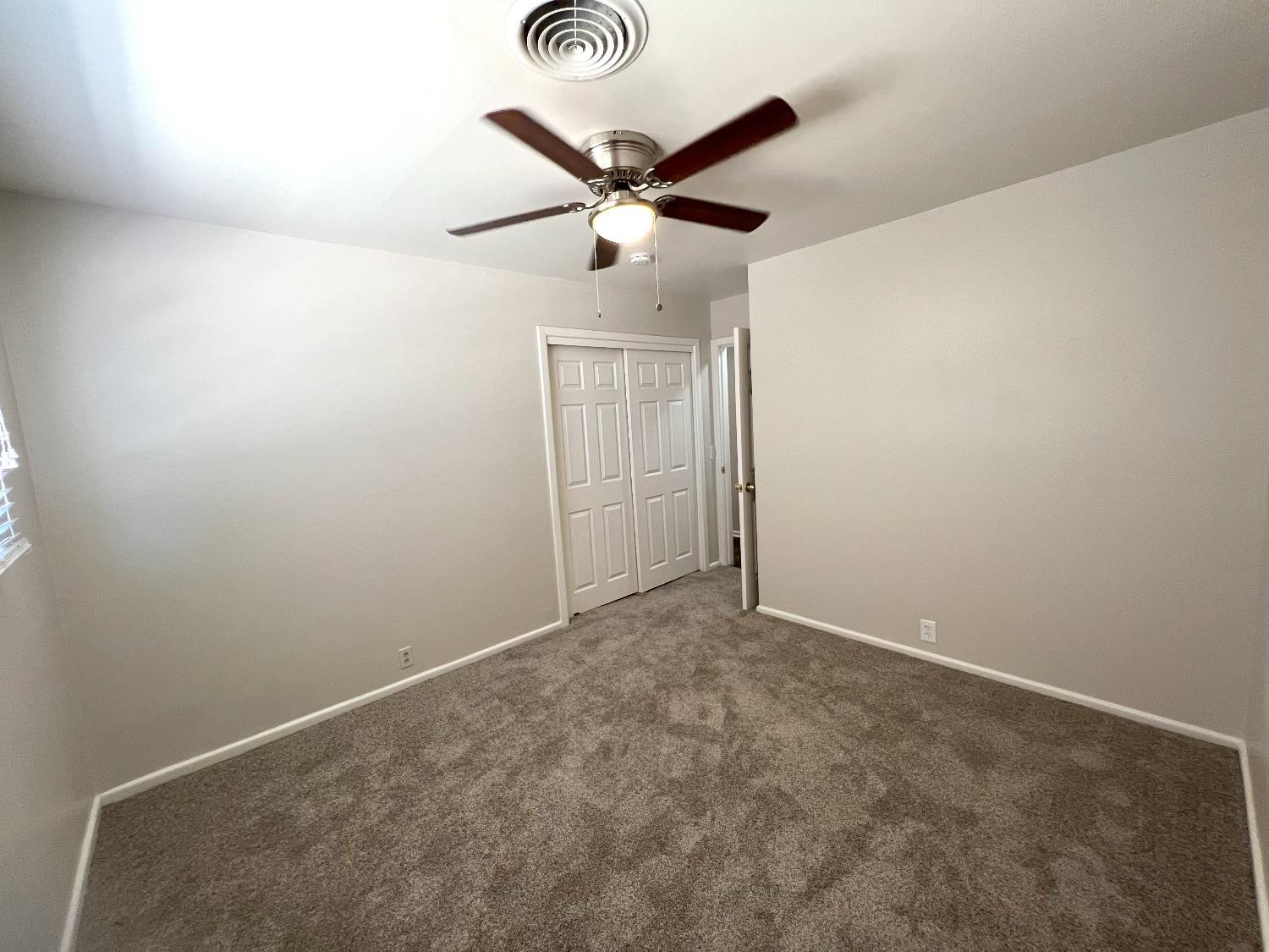 4214 54th Street Lubbock, TX 79413 - Photo 8 of 18 an a room with a ceiling fan