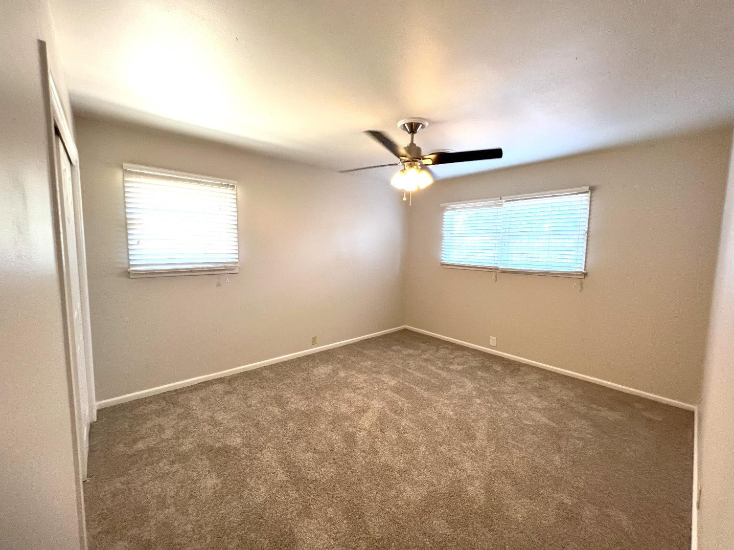 4214 54th Street Lubbock, TX 79413 - Photo 9 of 18 an empty room with a window