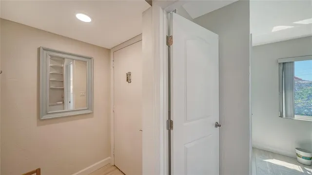 a view of a chair and table on the garden