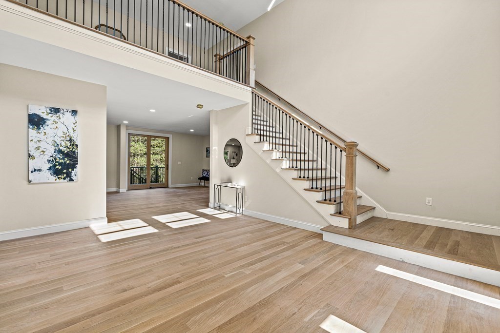 228 Ridge Street Winchester, MA 01890 - Photo 16 of 42 a view of entryway and hall with wooden floor