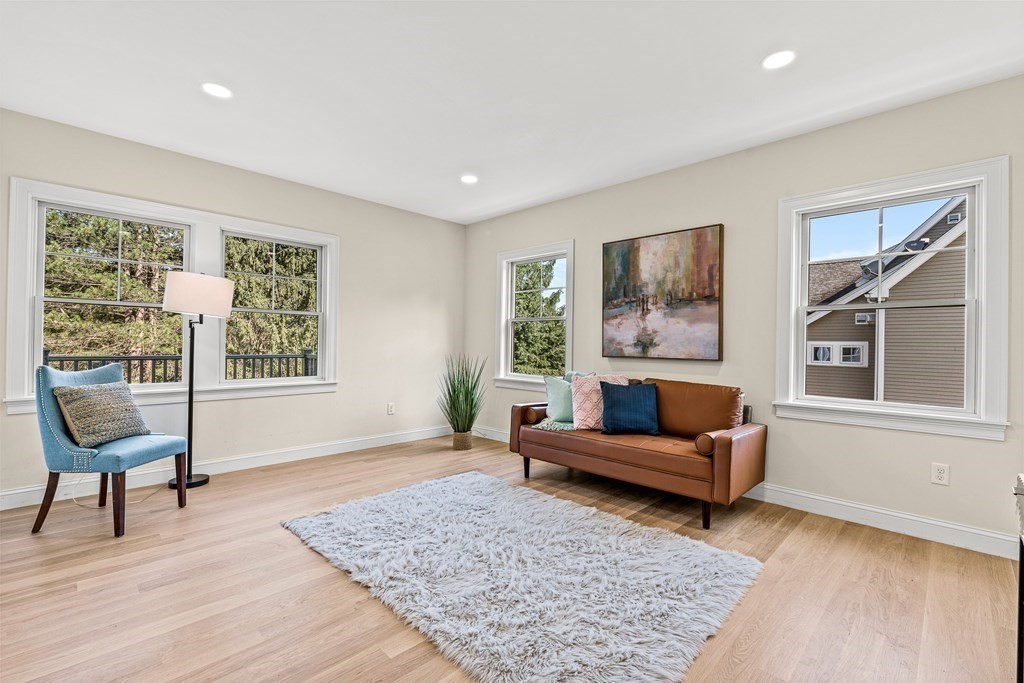228 Ridge Street Winchester, MA 01890 - Photo 20 of 42 a living room with furniture and a window