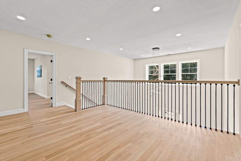 228 Ridge Street Winchester, MA 01890 - Photo 26 of 42 a view of a livingroom with stairs and a window