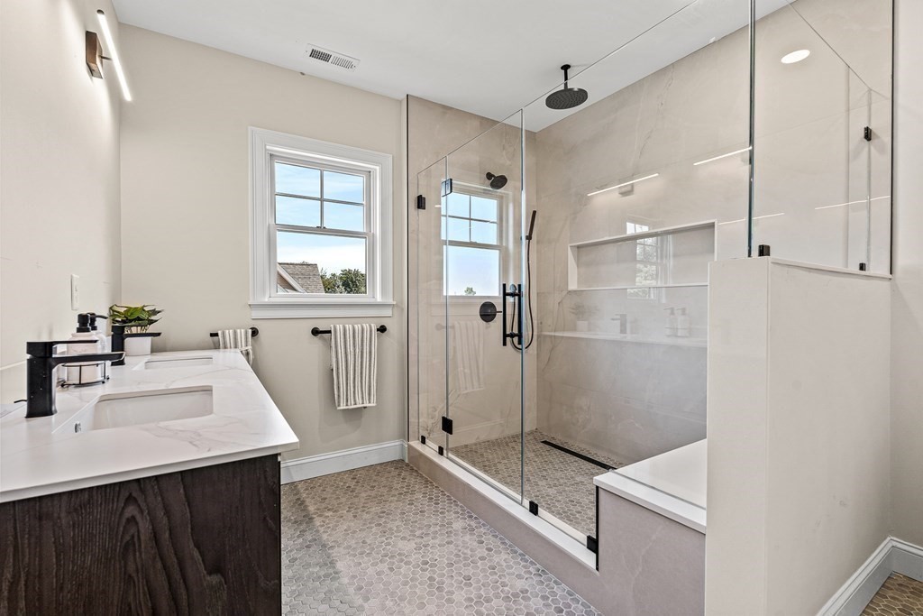 228 Ridge Street Winchester, MA 01890 - Photo 30 of 42 a bathroom with a sink a toilet and shower