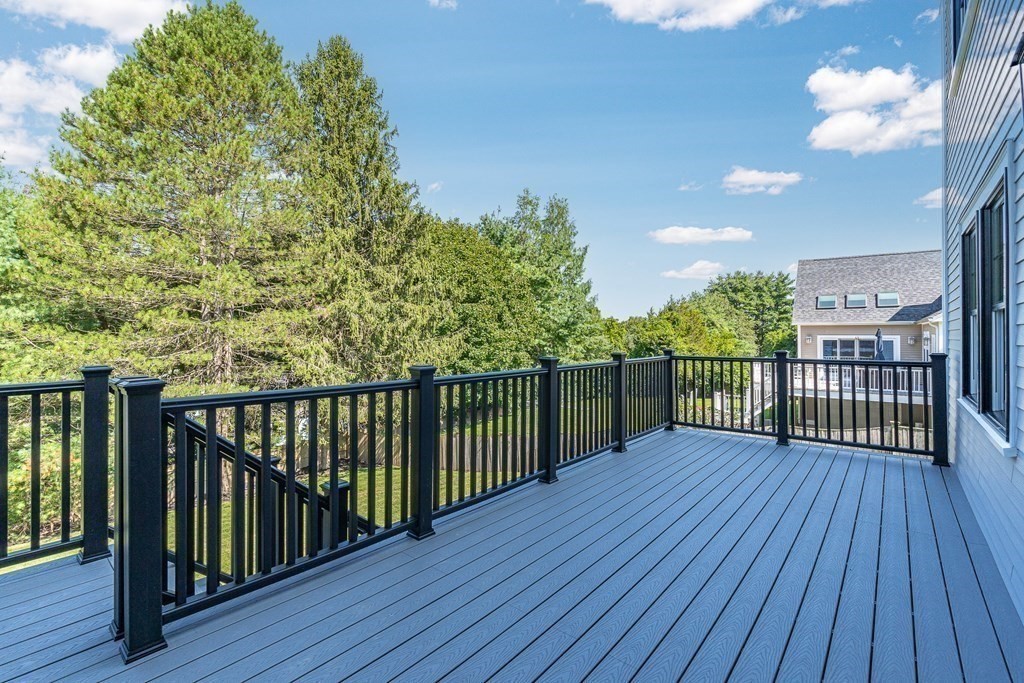 228 Ridge Street Winchester, MA 01890 - Photo 3 of 42 a view of balcony with wooden floor