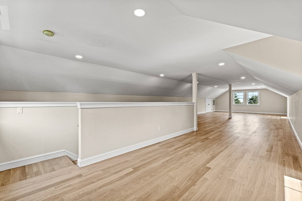228 Ridge Street Winchester, MA 01890 - Photo 34 of 42 wooden floor in an empty room with a window
