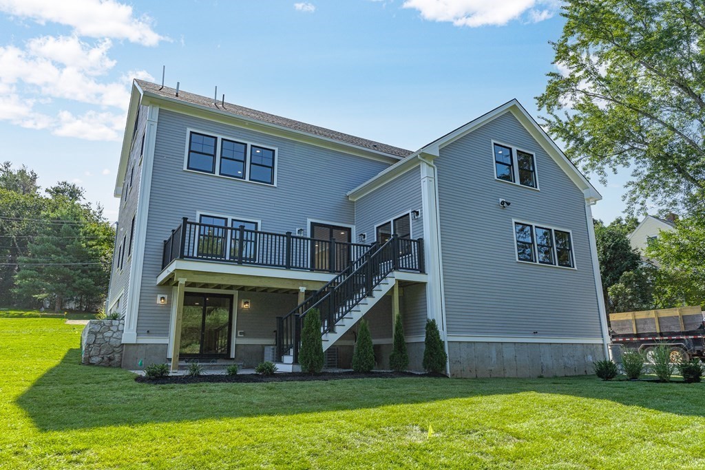 228 Ridge Street Winchester, MA 01890 - Photo 38 of 42 a view of house with a yard