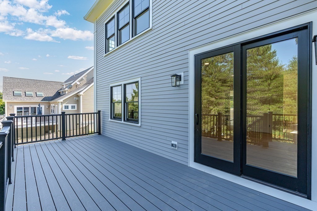 228 Ridge Street Winchester, MA 01890 - Photo 41 of 42 a view of a house with wooden deck