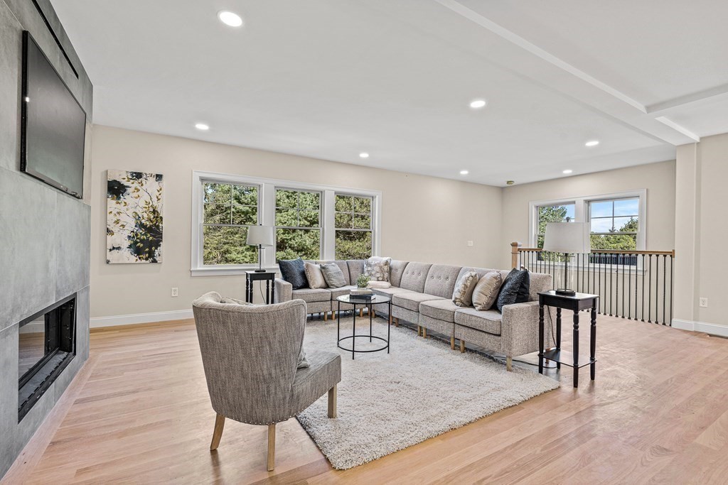 228 Ridge Street Winchester, MA 01890 - Photo 7 of 42 a living room with furniture and a wooden floor