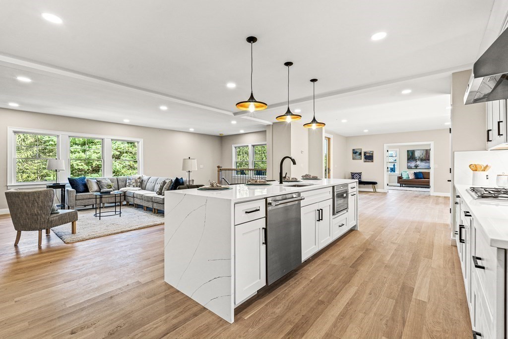 228 Ridge Street Winchester, MA 01890 - Photo 10 of 42 a kitchen with stove and wooden floor