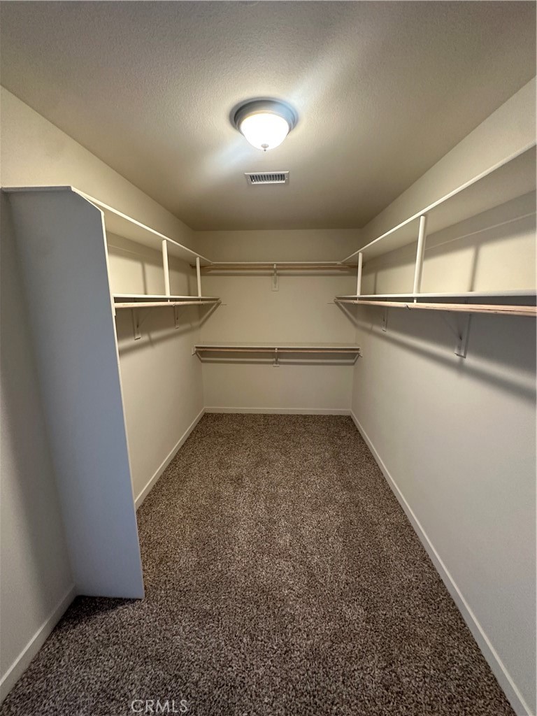 15009 Temecula Road Apple Valley, CA 92307 - Photo 29 of 64 Primary Bedroom Walk in Closet